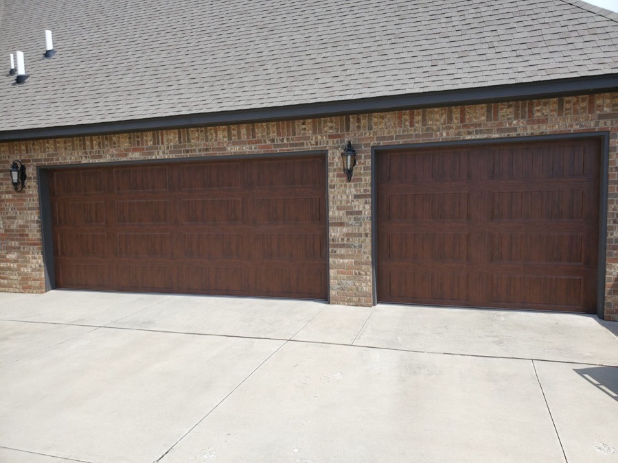 Walnut-finish garage door installed by Thunder Garage Door